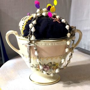 Vintage upscaled pin cushion Homer Laughlin sugar bowl.